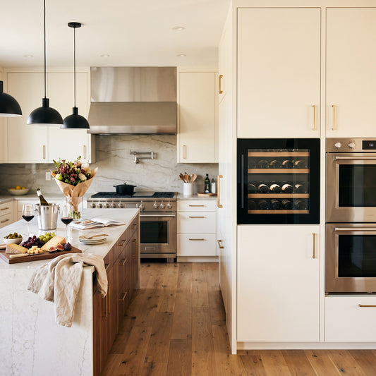 Compact 30 Dual 30-bottle wine cellar installed in a modern fitted kitchen