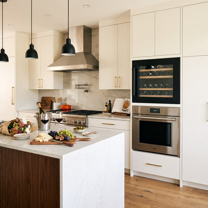 Compact 30 Single 30-bottle wine cellar installed in a modern fitted kitchen